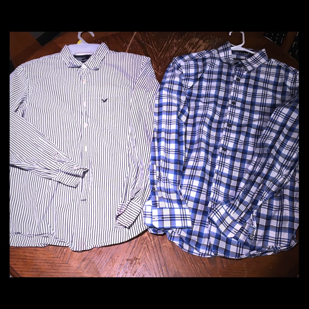 Two men’s button up shirts